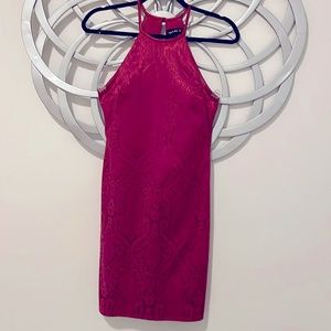 Stand out in this magenta brocade body con dress. Worn once.